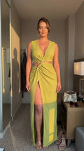 Model wearing lime green twist front cutout maxi dress, front view