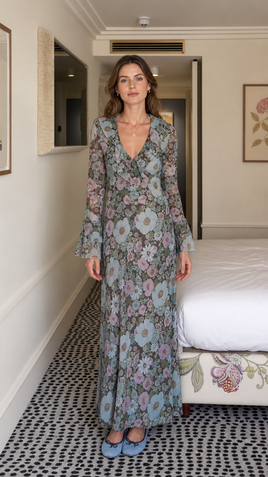 Front view of model wearing blue floral maxi dress