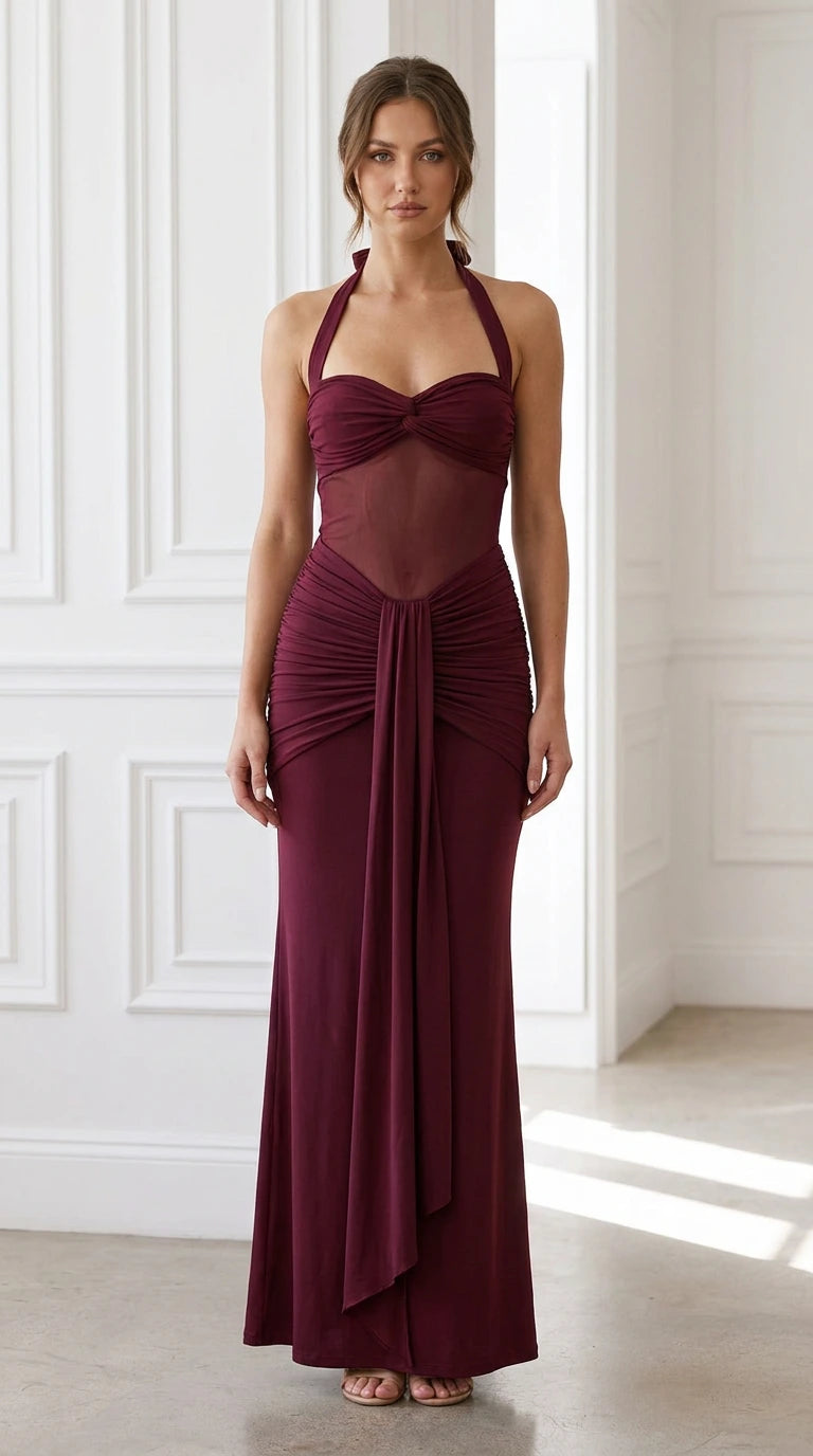 Front view of model wearing burgundy halter neck maxi dress