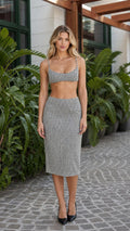 Model wearing black houndstooth two piece set front view
