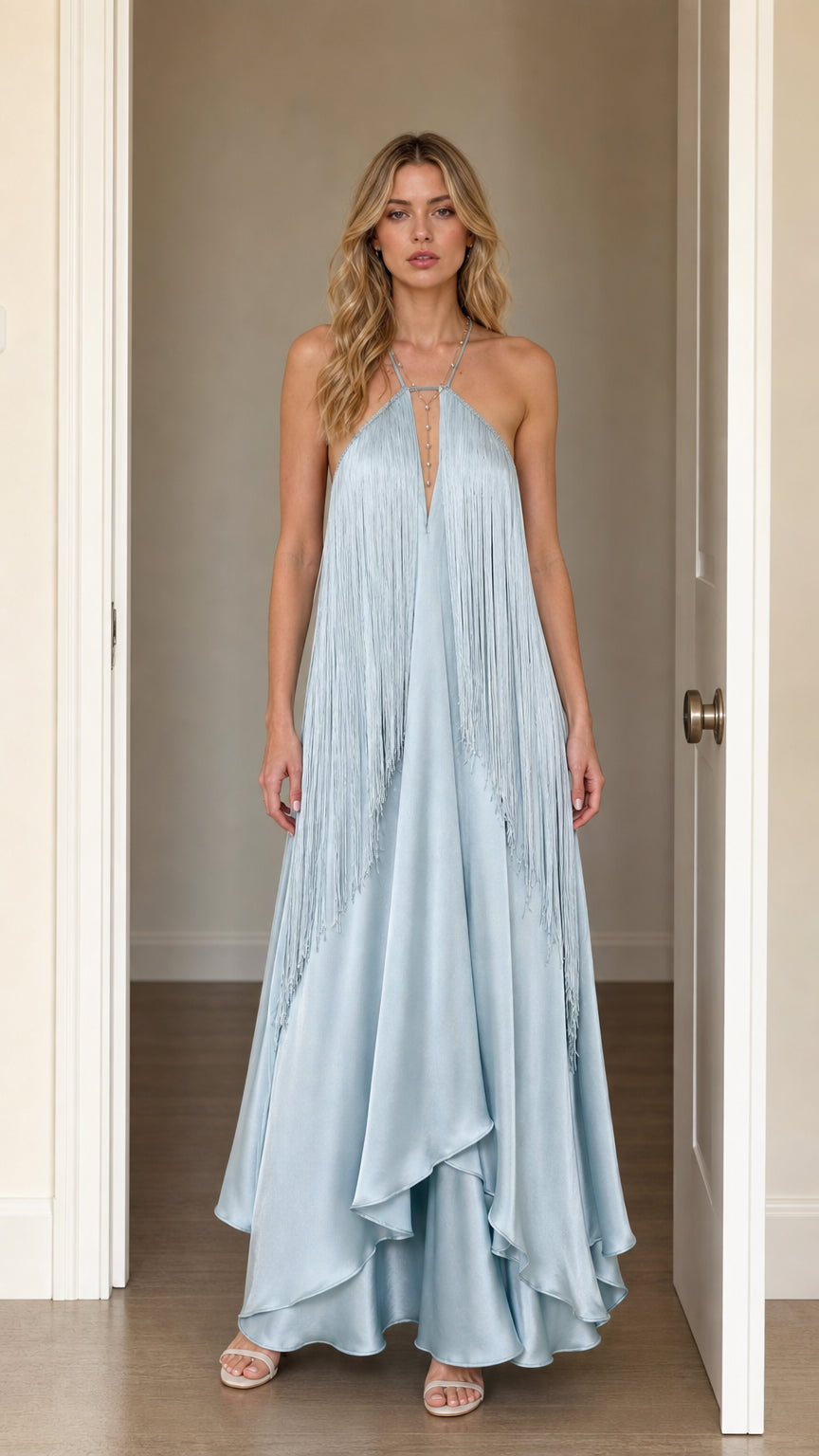 Front view of model wearing Light Blue halter fringe maxi dress