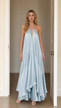 Front view of model wearing Light Blue halter fringe maxi dress