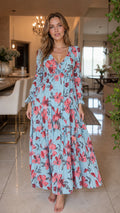 Front view of light blue floral long sleeve tiered maxi dress