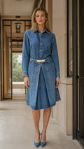 Front view of blue denim shirt dress on model