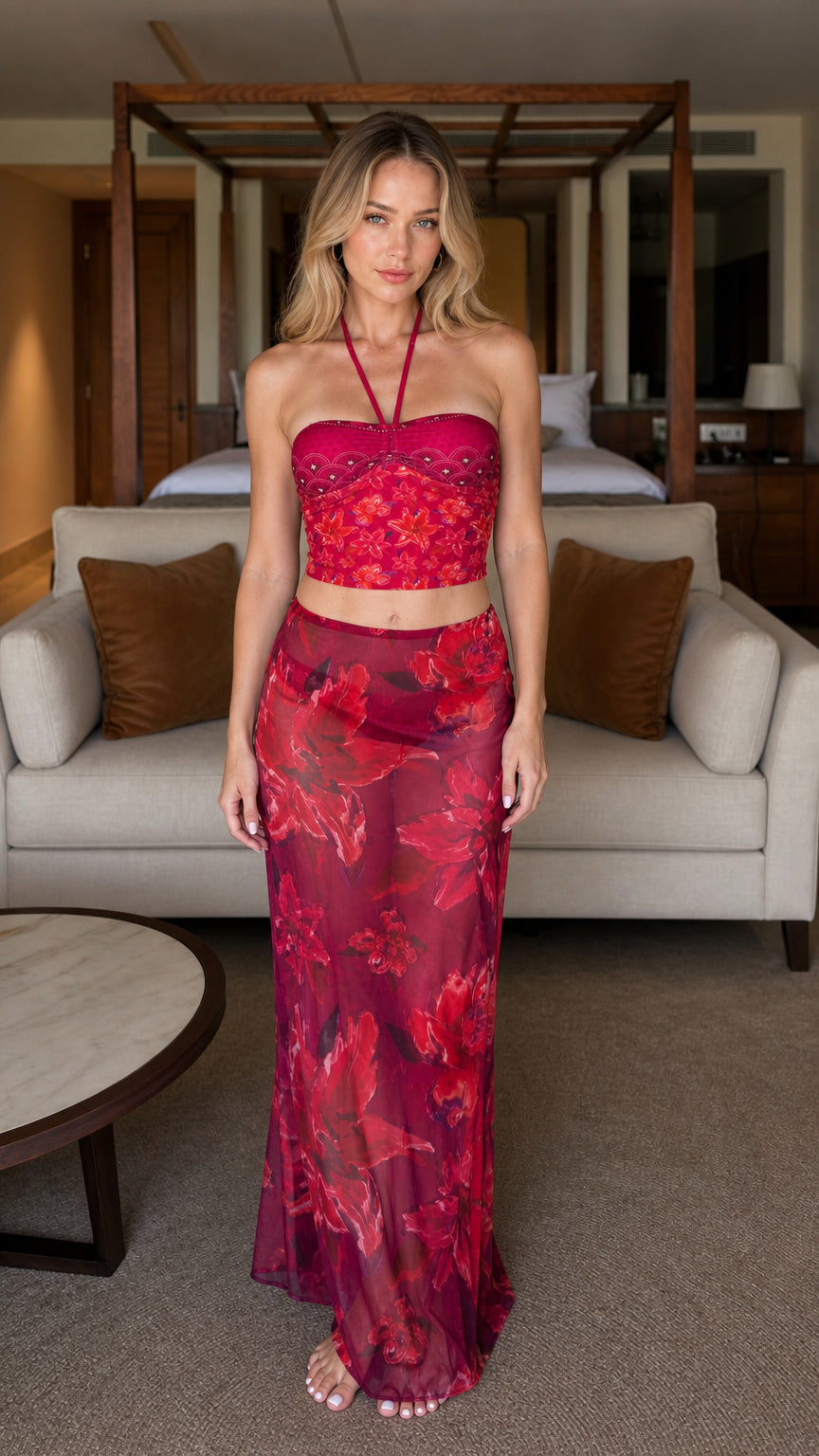 Front view of model wearing Fuchsia floral halter top and maxi skirt set