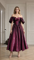 Front view of burgundy off-shoulder satin evening dress