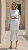 Front view of model wearing white wavy knit two-piece set