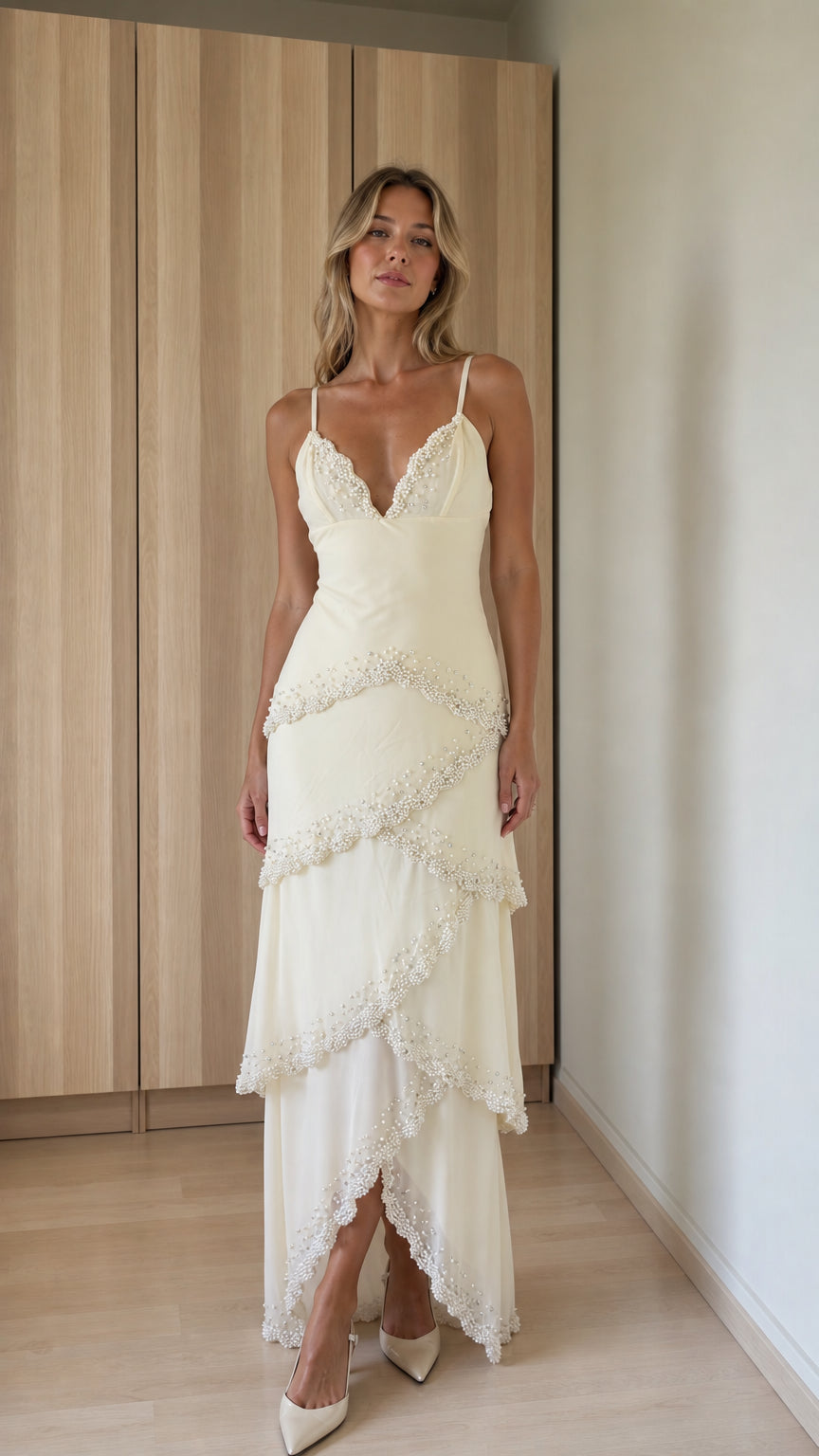 Front view of ivory tiered beaded maxi dress