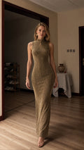 Front view of model wearing gold metallic high-neck maxi dress