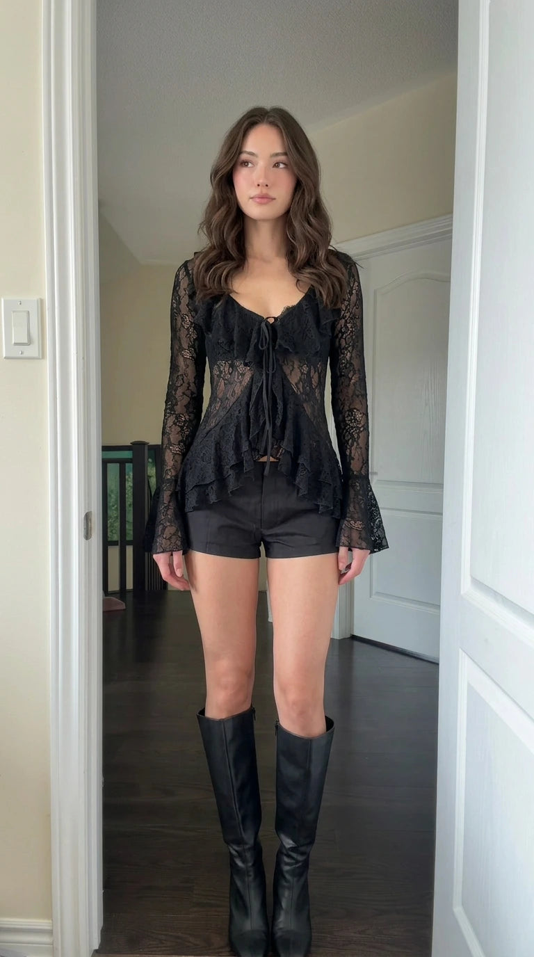 Model wearing Black sheer lace ruffle tie-front blouse, front view