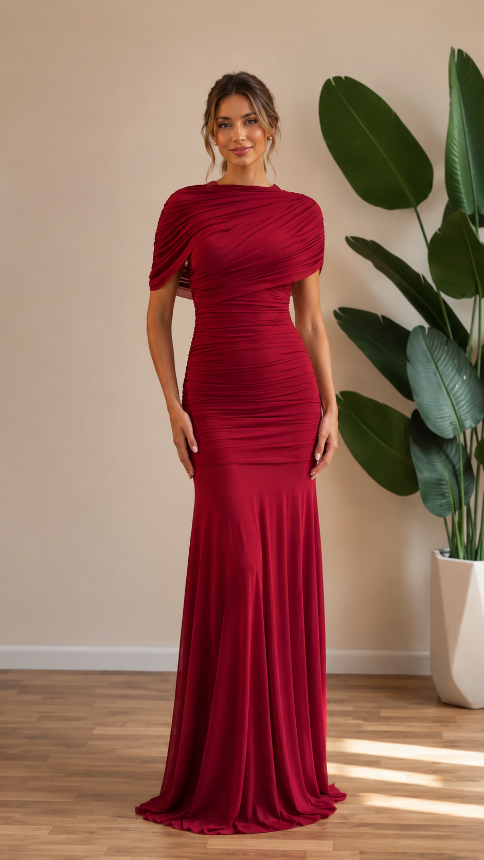 Front view of burgundy ruched draped mermaid maxi gown
