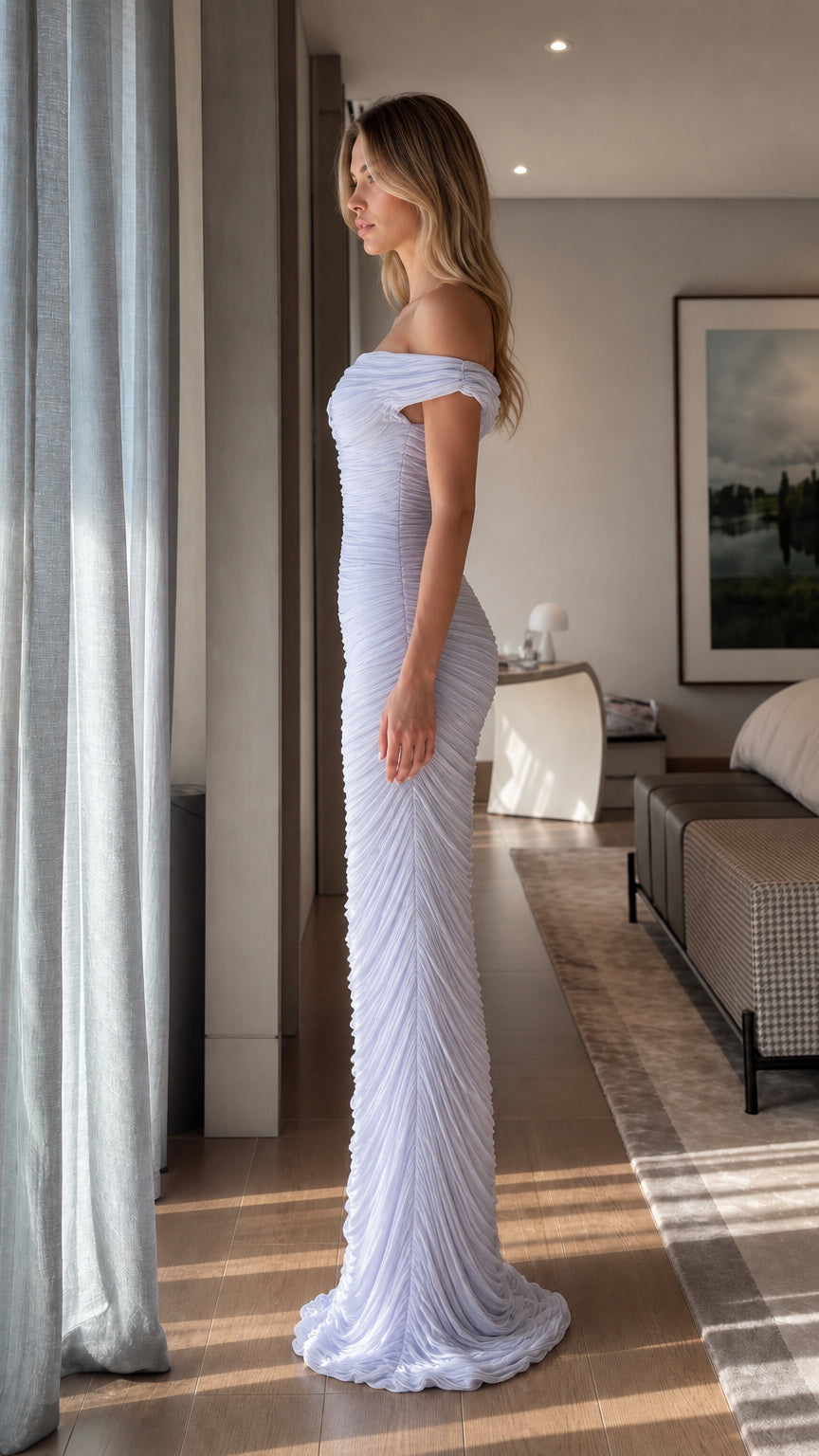 Side profile view of light blue ruched maxi dress