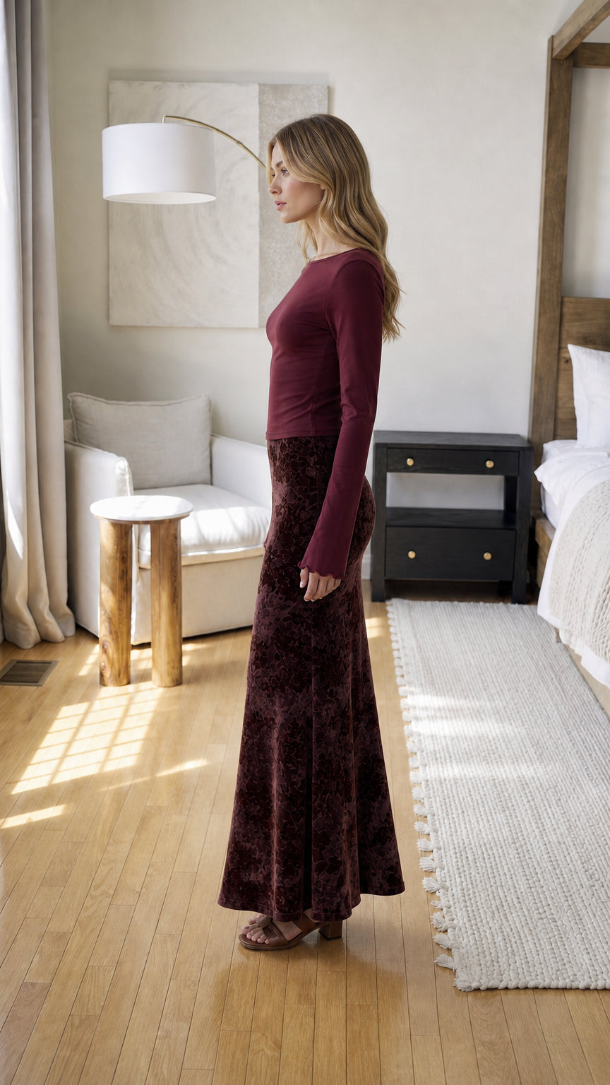 Side profile view of burgundy outfit set