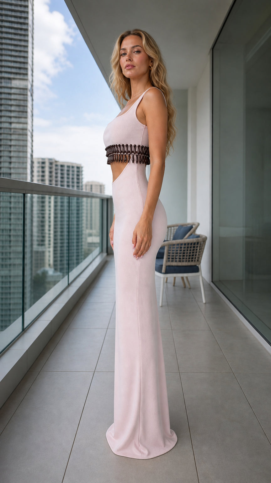Side profile view of pink beaded cutout maxi dress