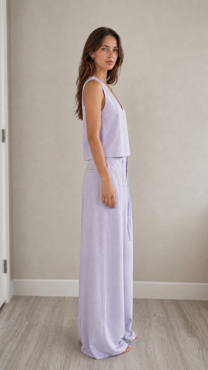 Side profile view of model in lavender two-piece set