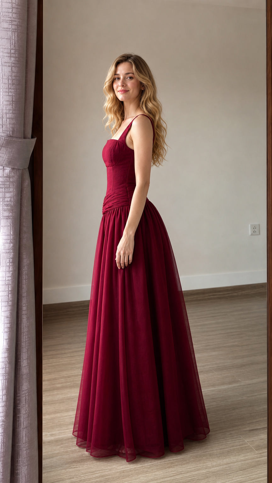 Side profile view of burgundy evening dress
