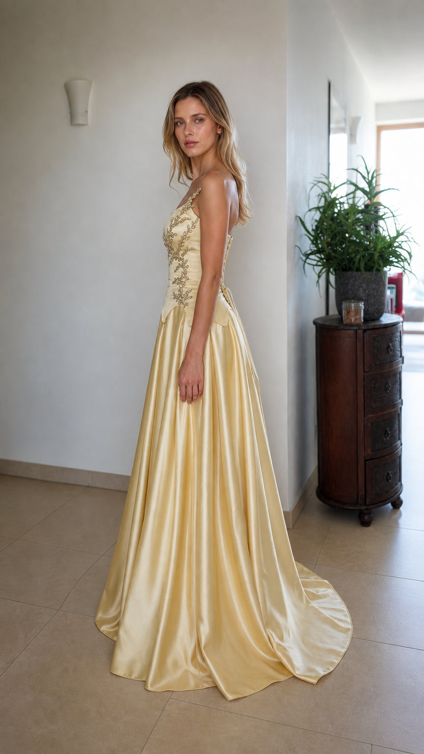 Side profile view of champagne evening gown