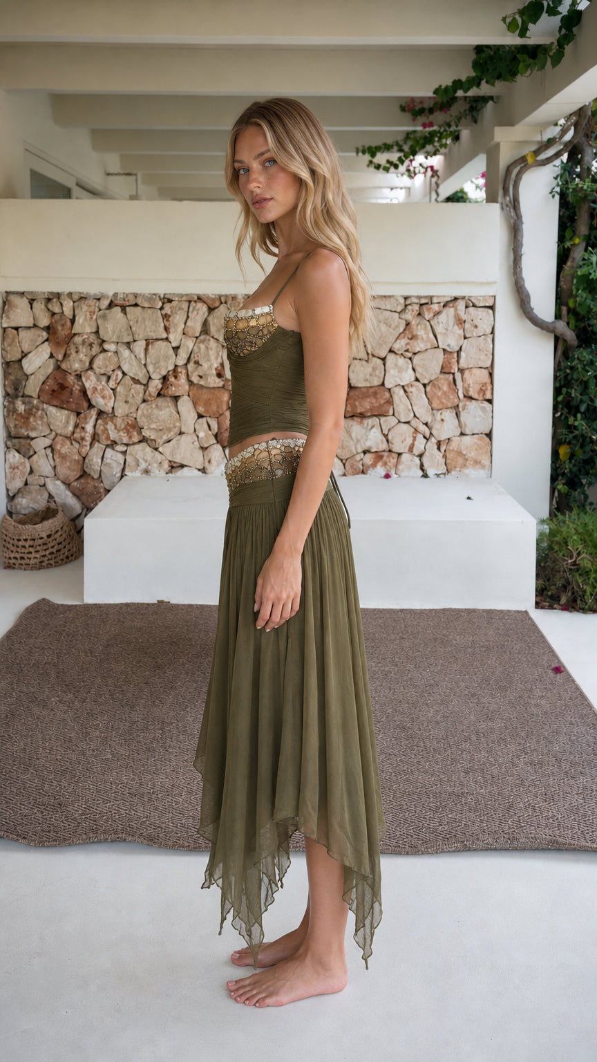 Side profile view of model in olive green matching set