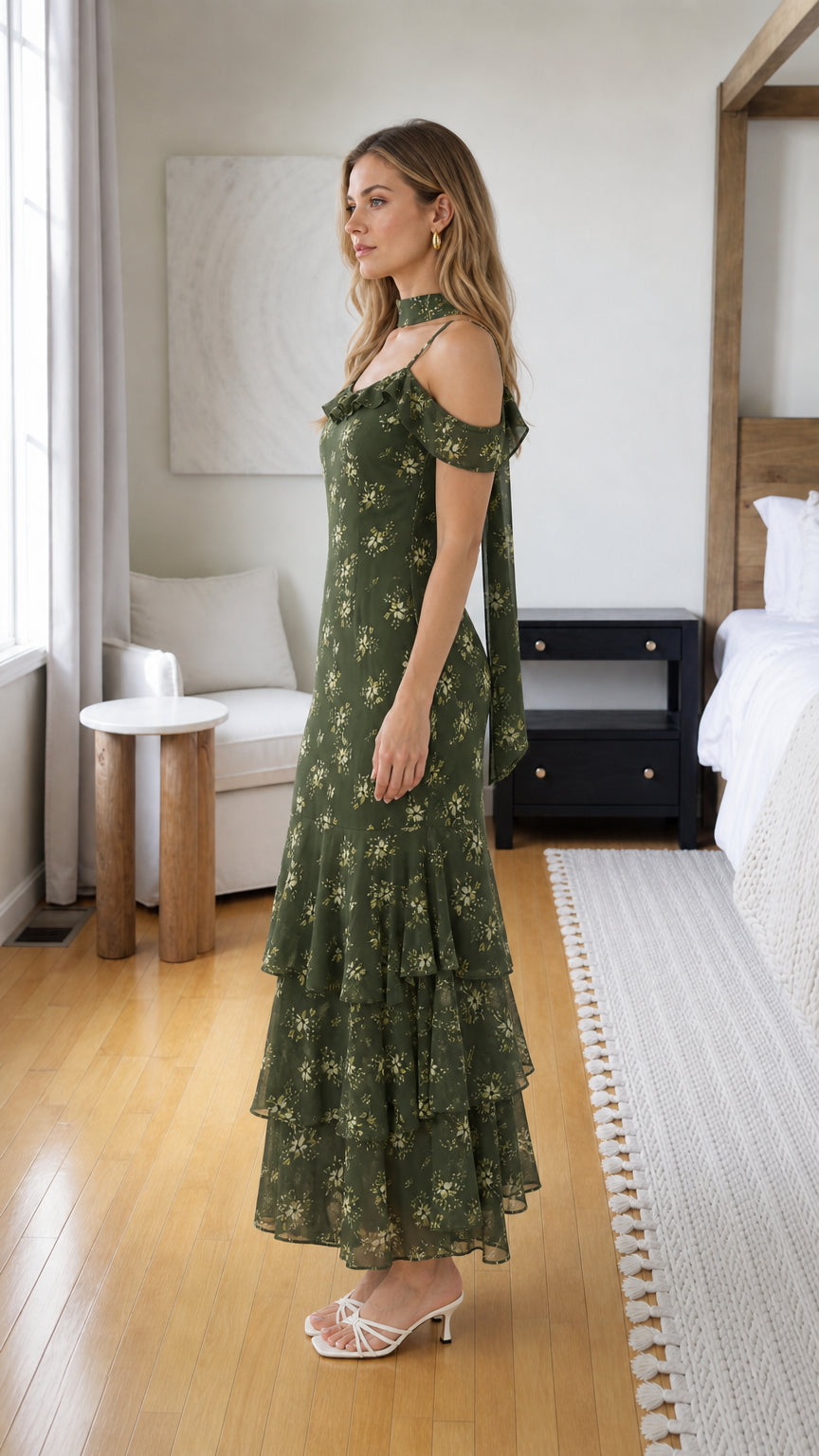 Model wearing olive floral print midi dress, side view
