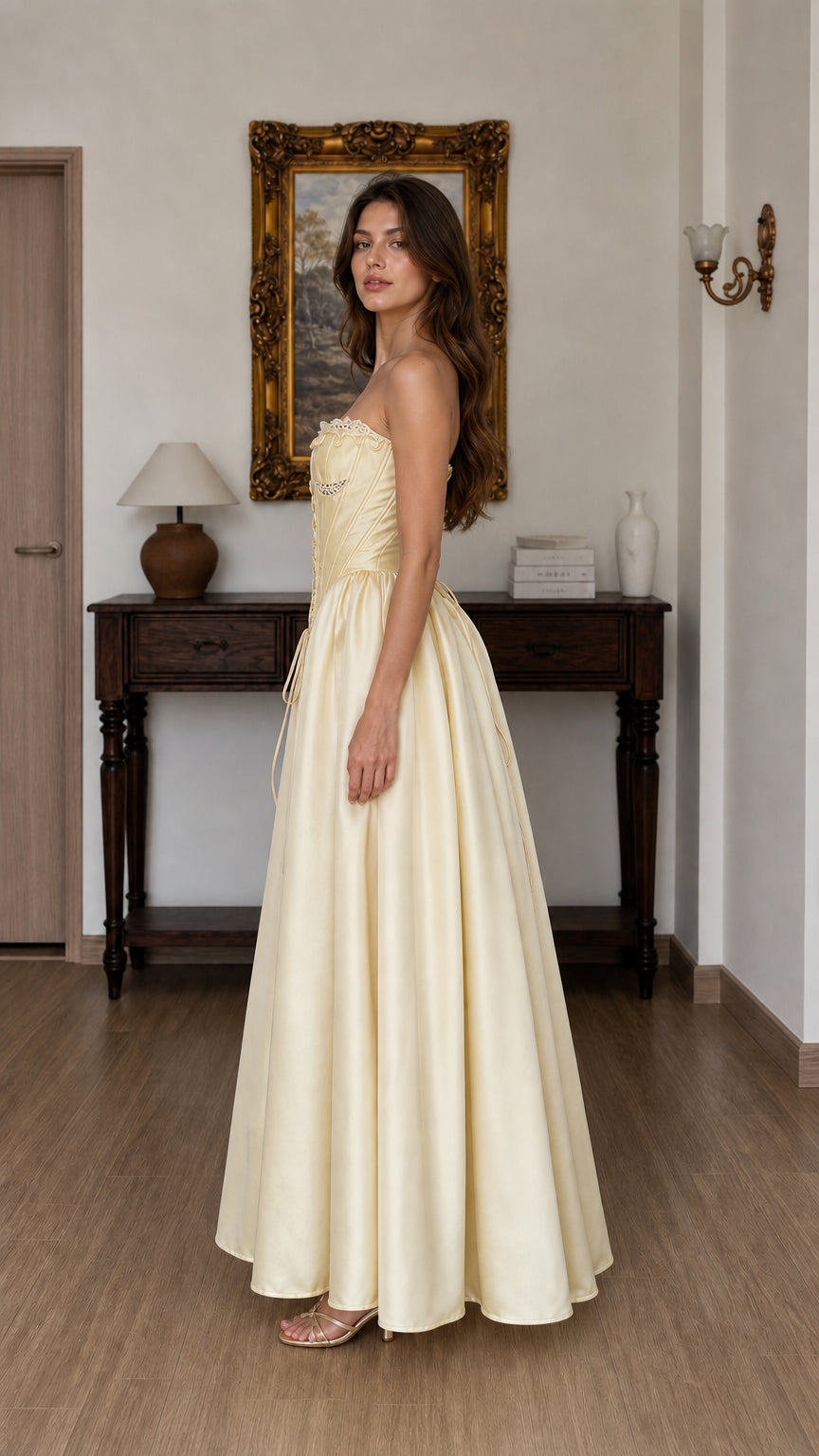 Side profile view of yellow corset ball gown