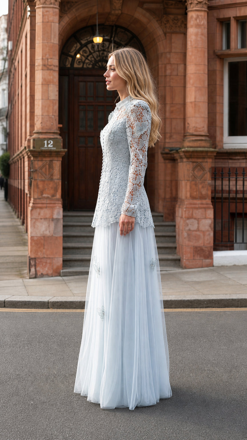 Side profile view of light blue lace maxi dress