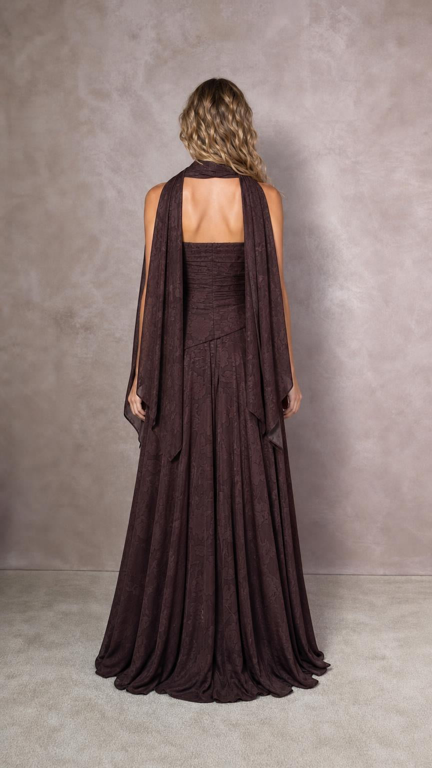 Back view of model showing draped scarf detail on espresso brown dress