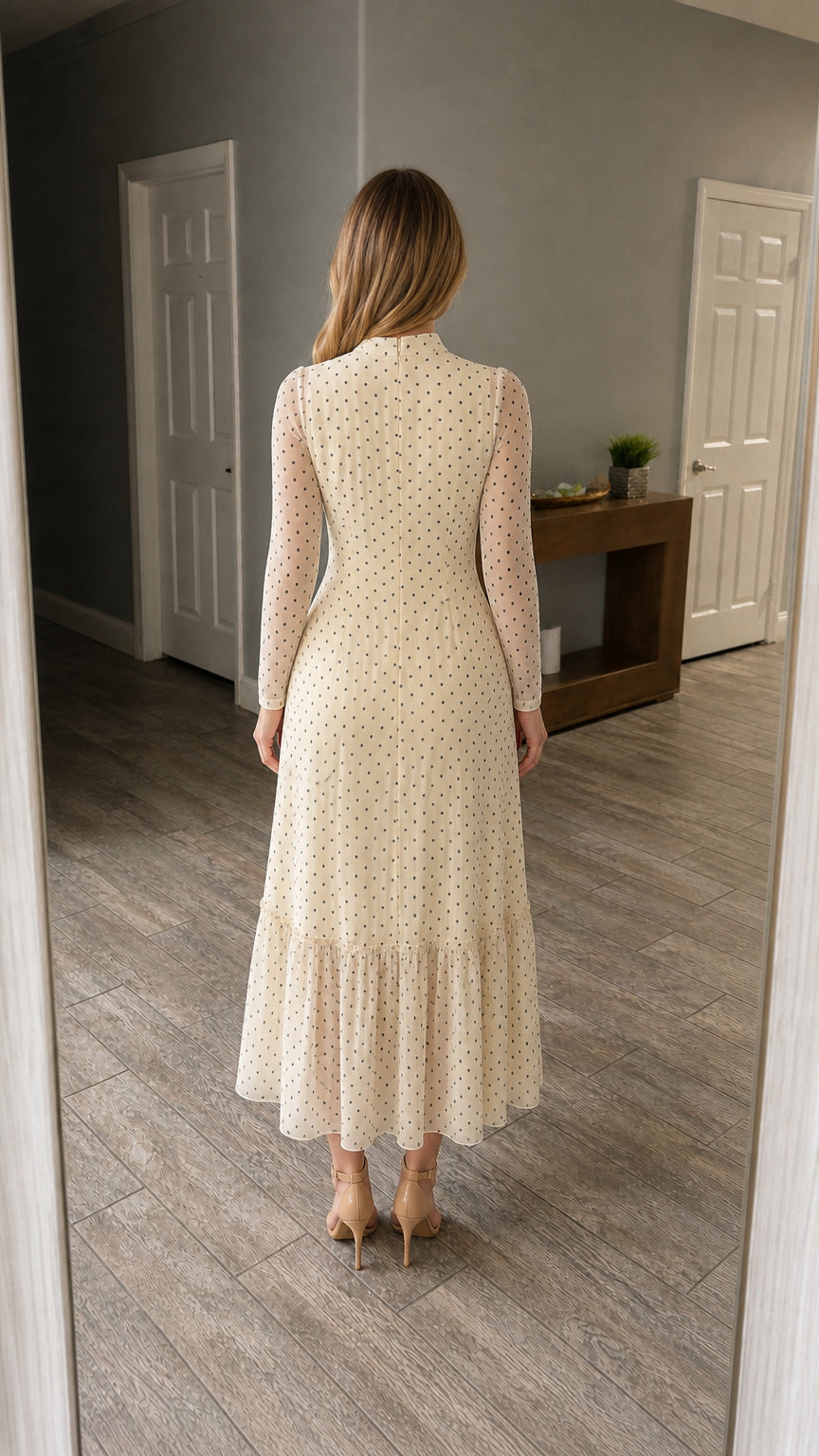 Back view of cream polka dot dress