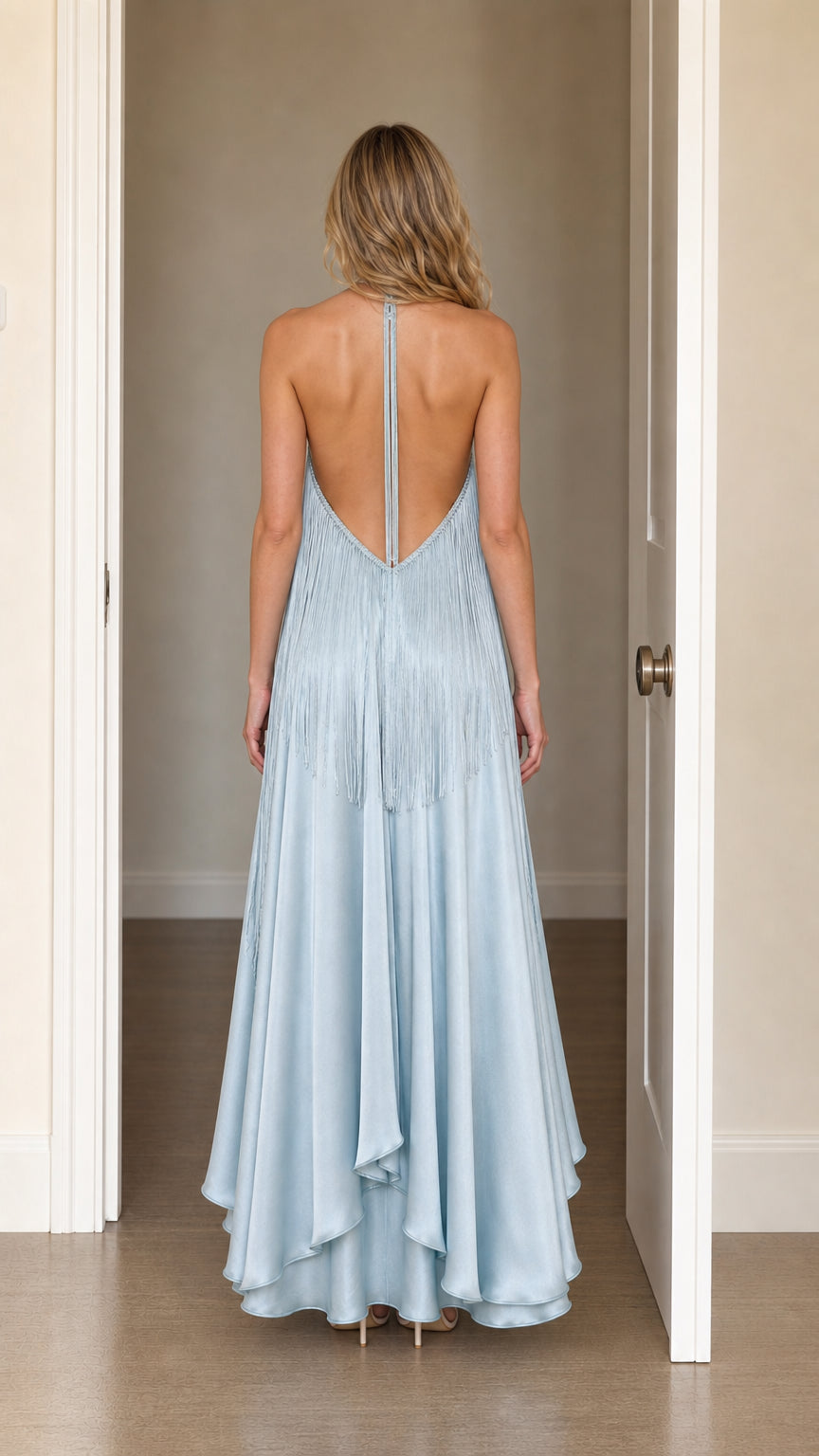 Back view showing open back of Light Blue halter fringe maxi dress