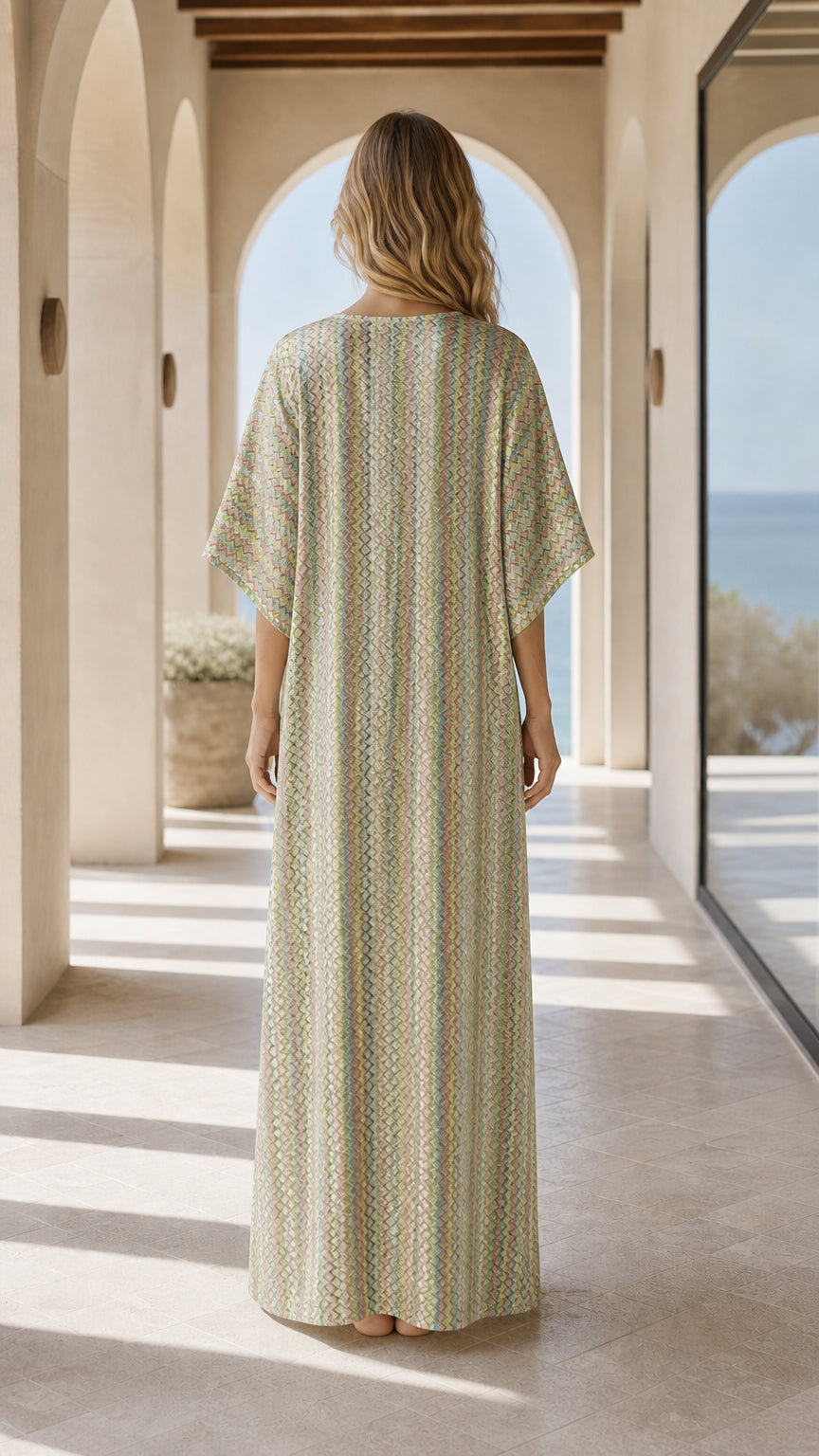 Back view of woman wearing multi sage kaftan dress