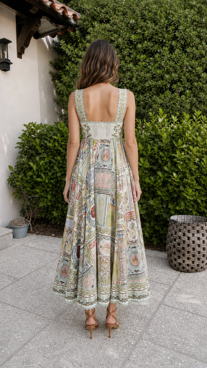 Back view of sage printed midi dress