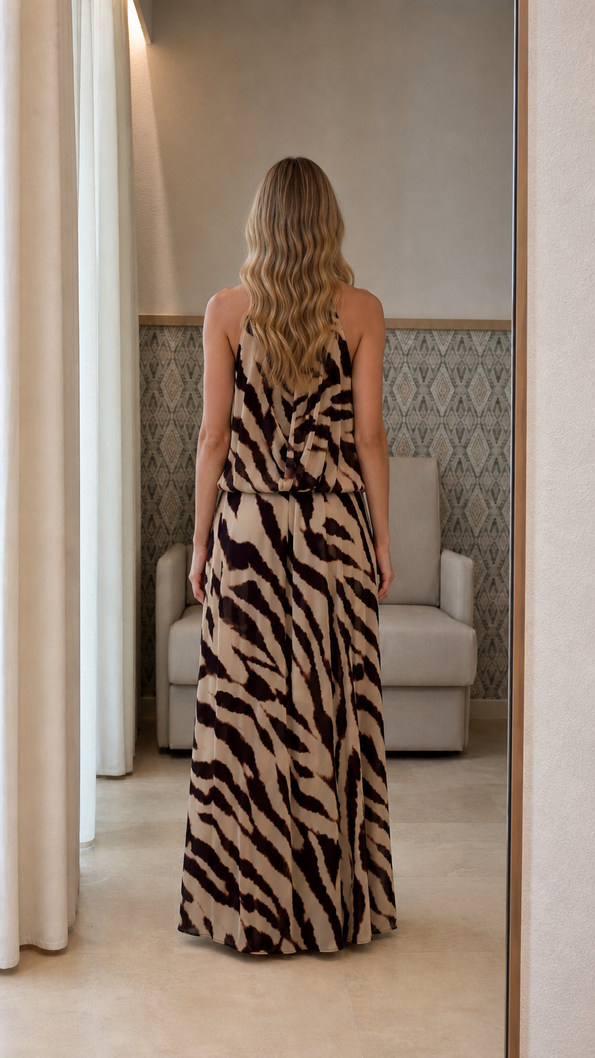 Back view of beige animal print maxi dress
