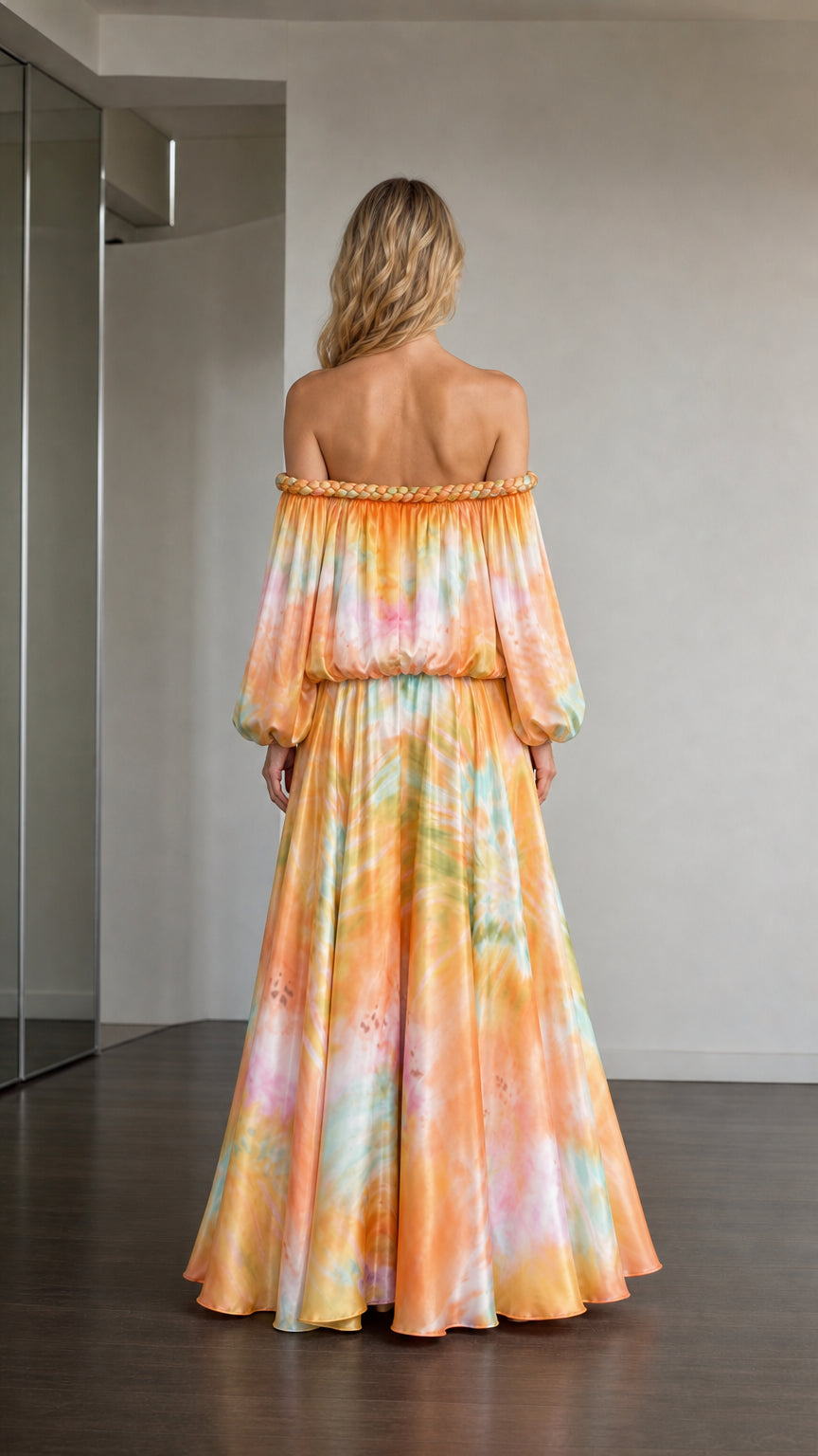 Back view of model in orange multi tie-dye maxi dress