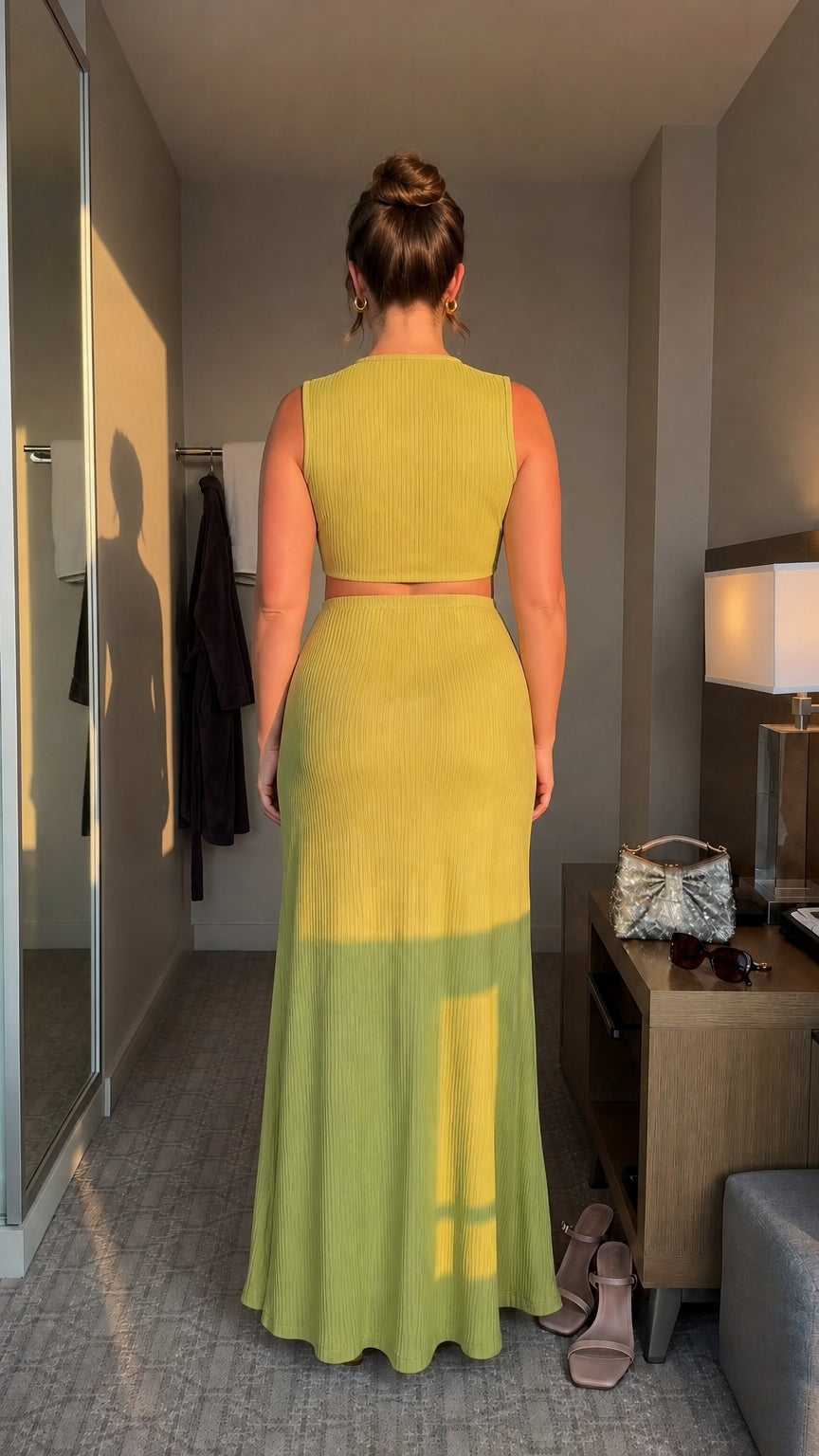 Model wearing lime green maxi dress, back view
