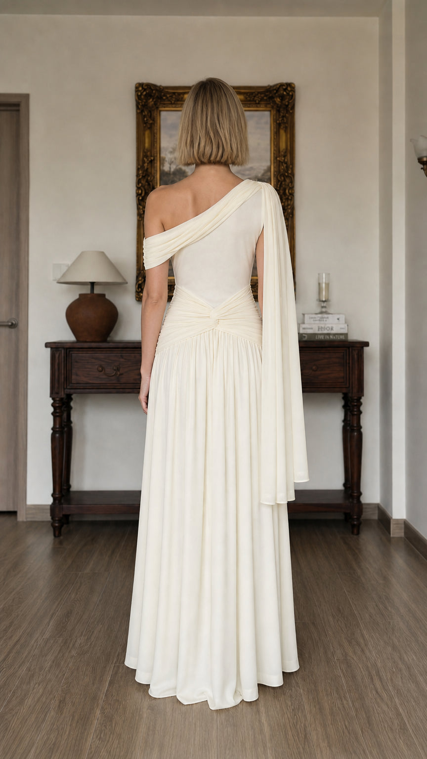 Back view of Ivory formal gown showing drape