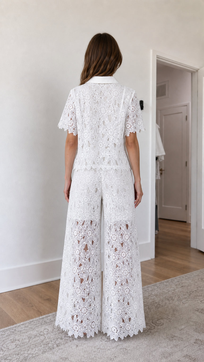 Back view of woman wearing white lace matching set