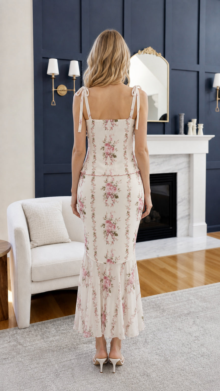 Back view of woman wearing ivory floral midi dress