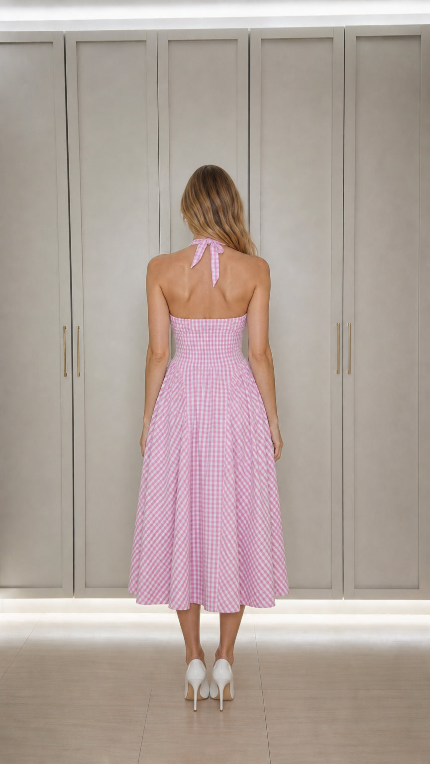 Back view showing halter neck tie and open back