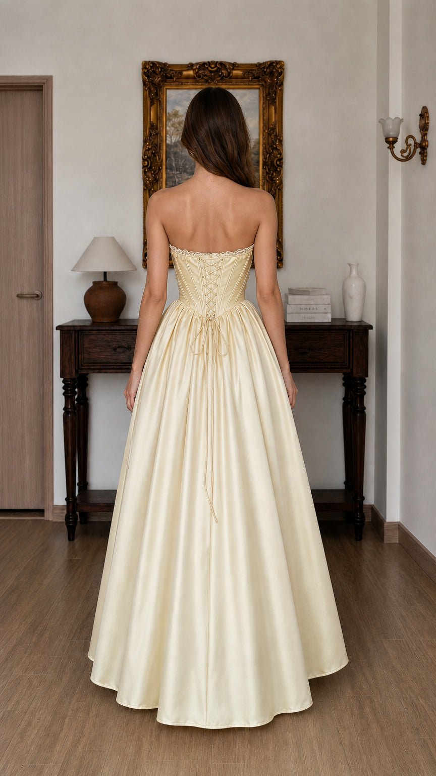 Back view showing lace-up detail of yellow gown