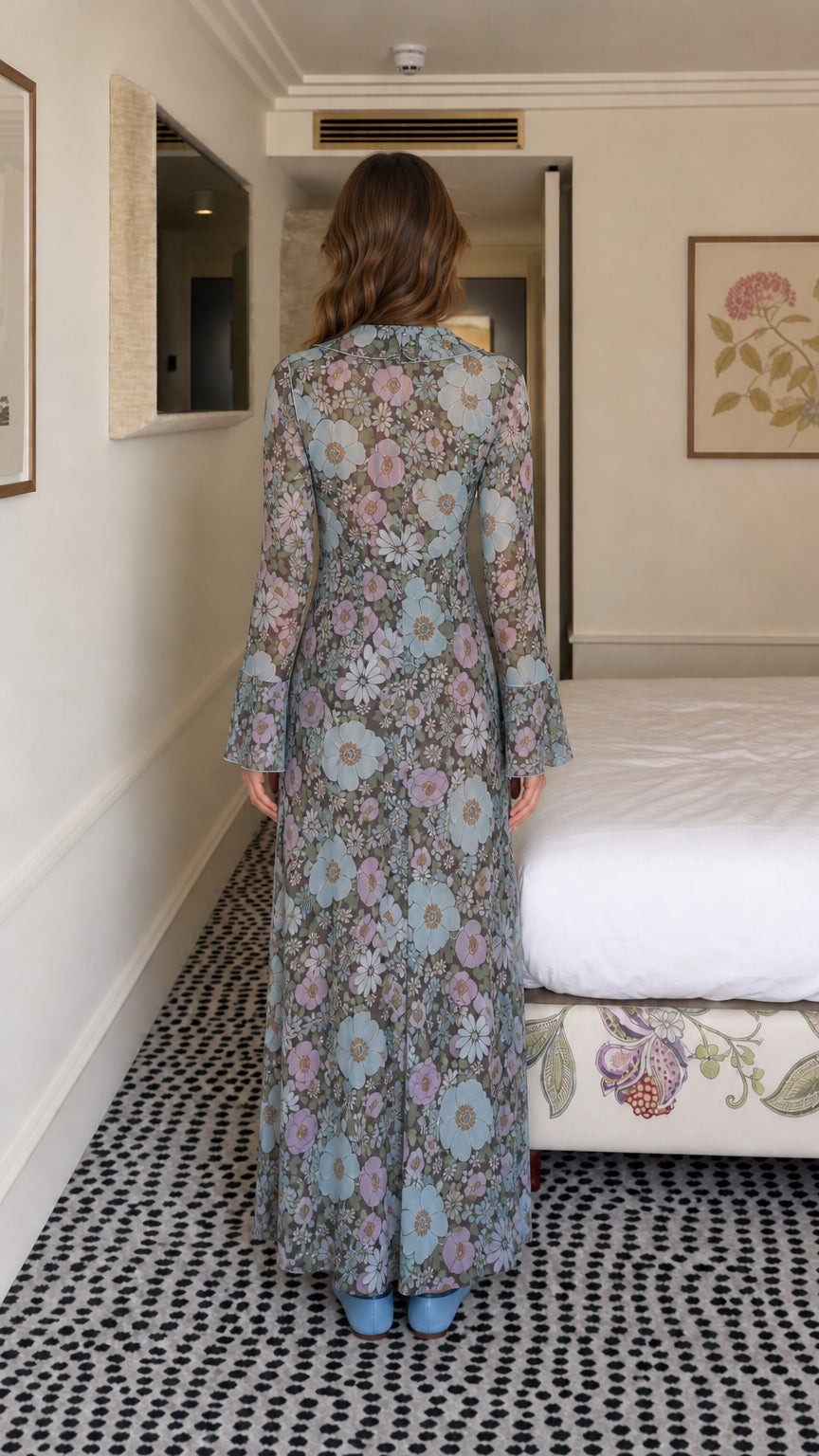 Back view of model in blue floral maxi dress