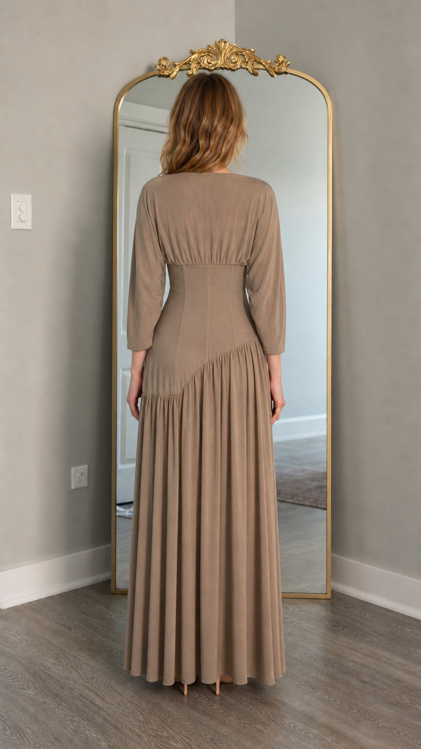 Back view of model wearing taupe maxi dress
