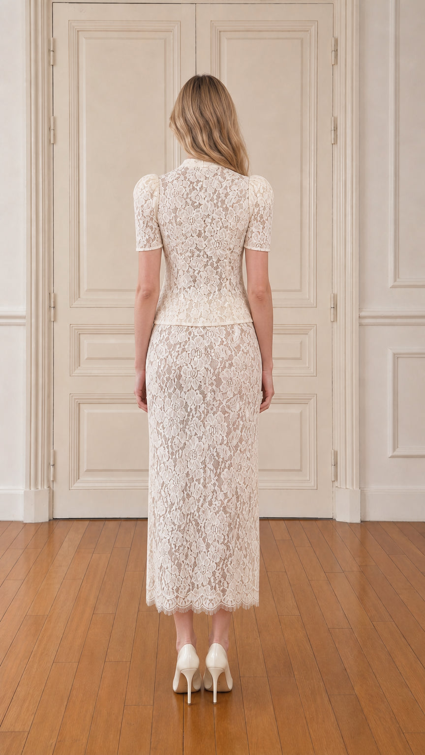 Model wearing cream lace set, back view