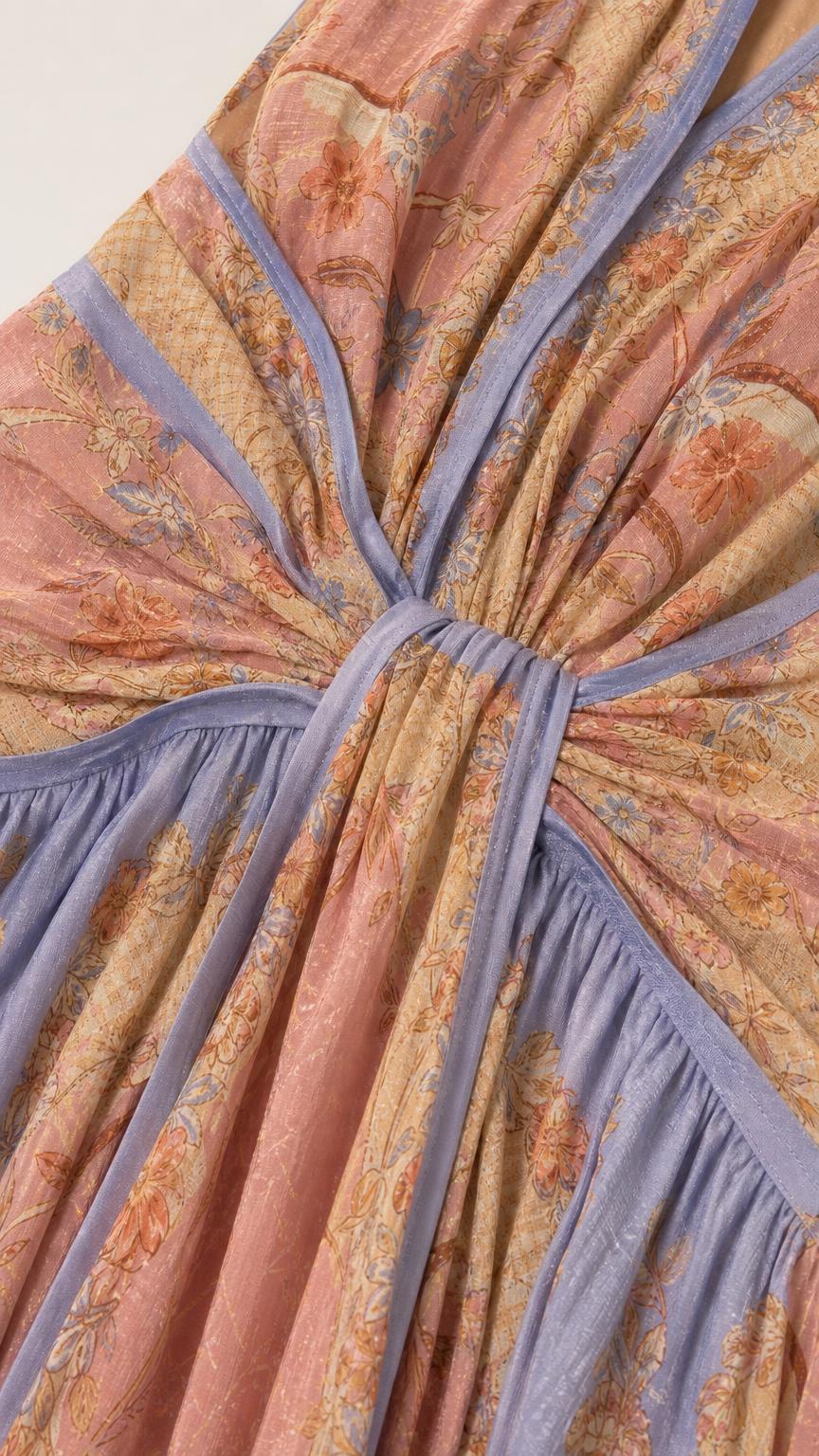 Close-up detail of gathered front knot and printed fabric