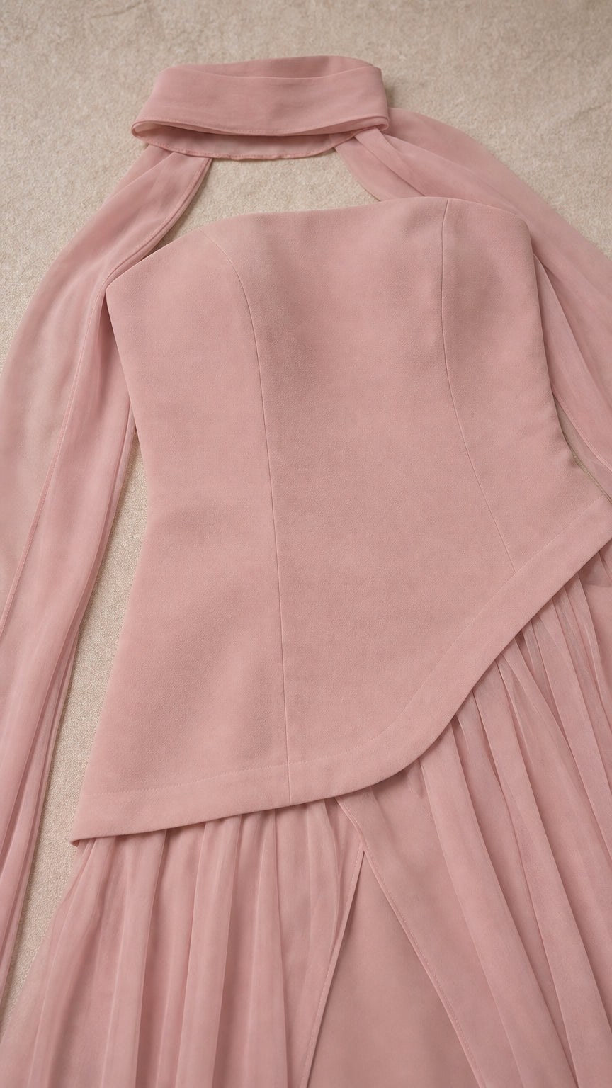 Close-up of choker neckline and structured bodice construction