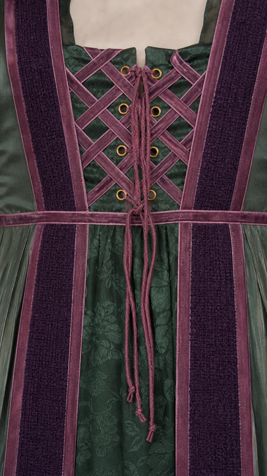 Close-up of lace-up corset bodice and velvet trim