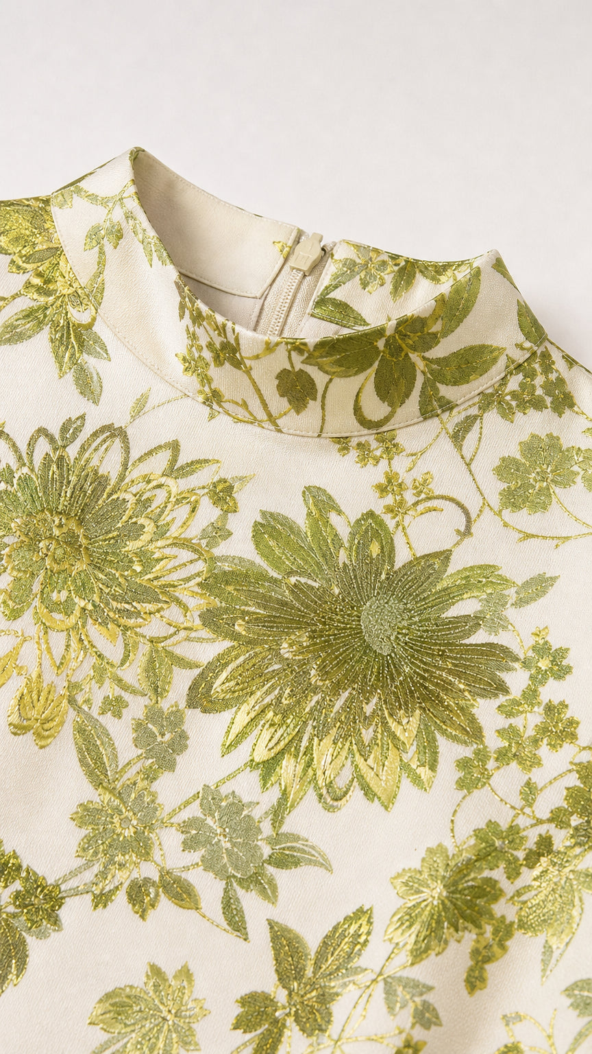 Close-up of mock neck and floral jacquard pattern