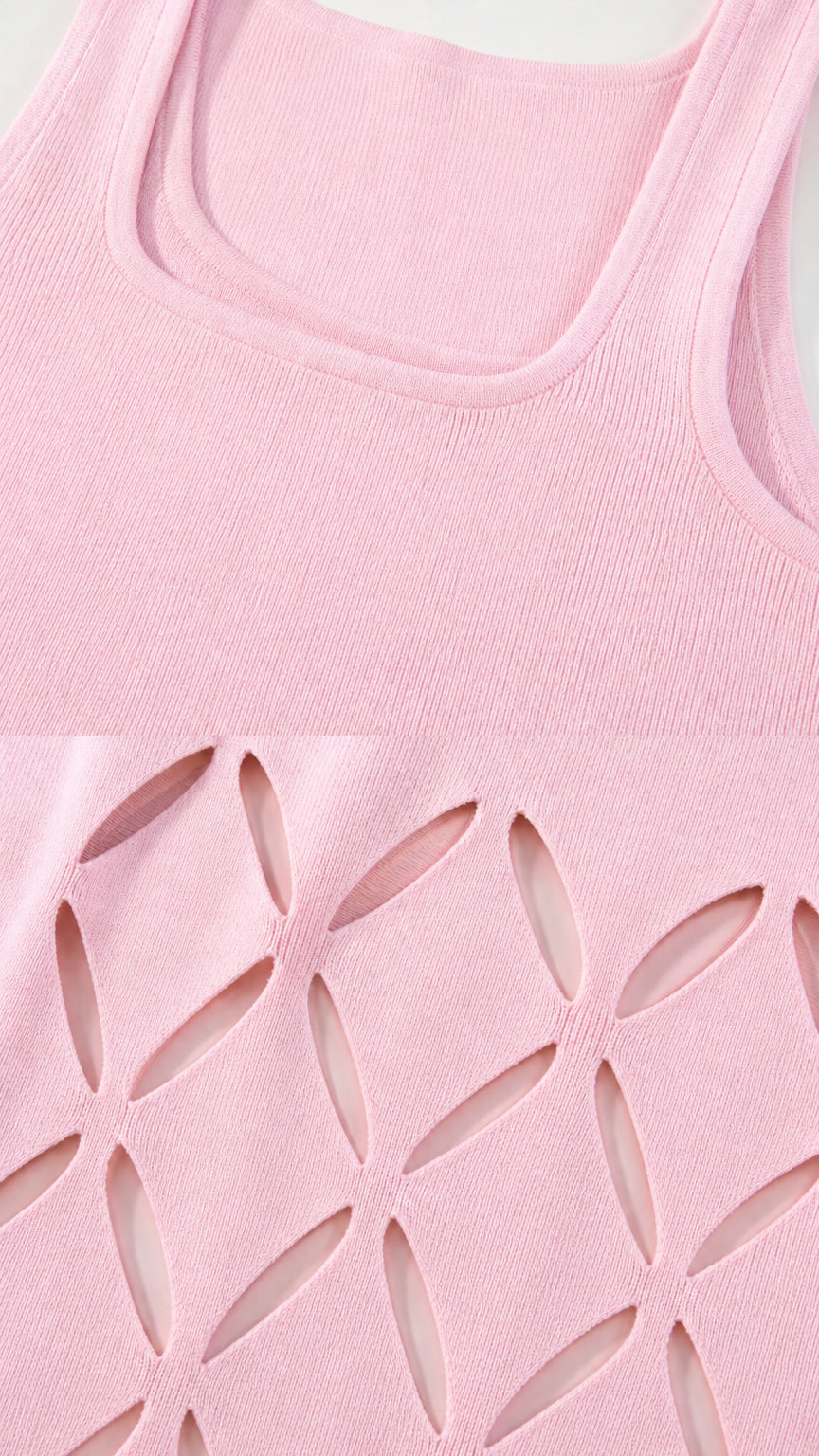 Close-up detail of square neckline and hem cutouts on pink dress