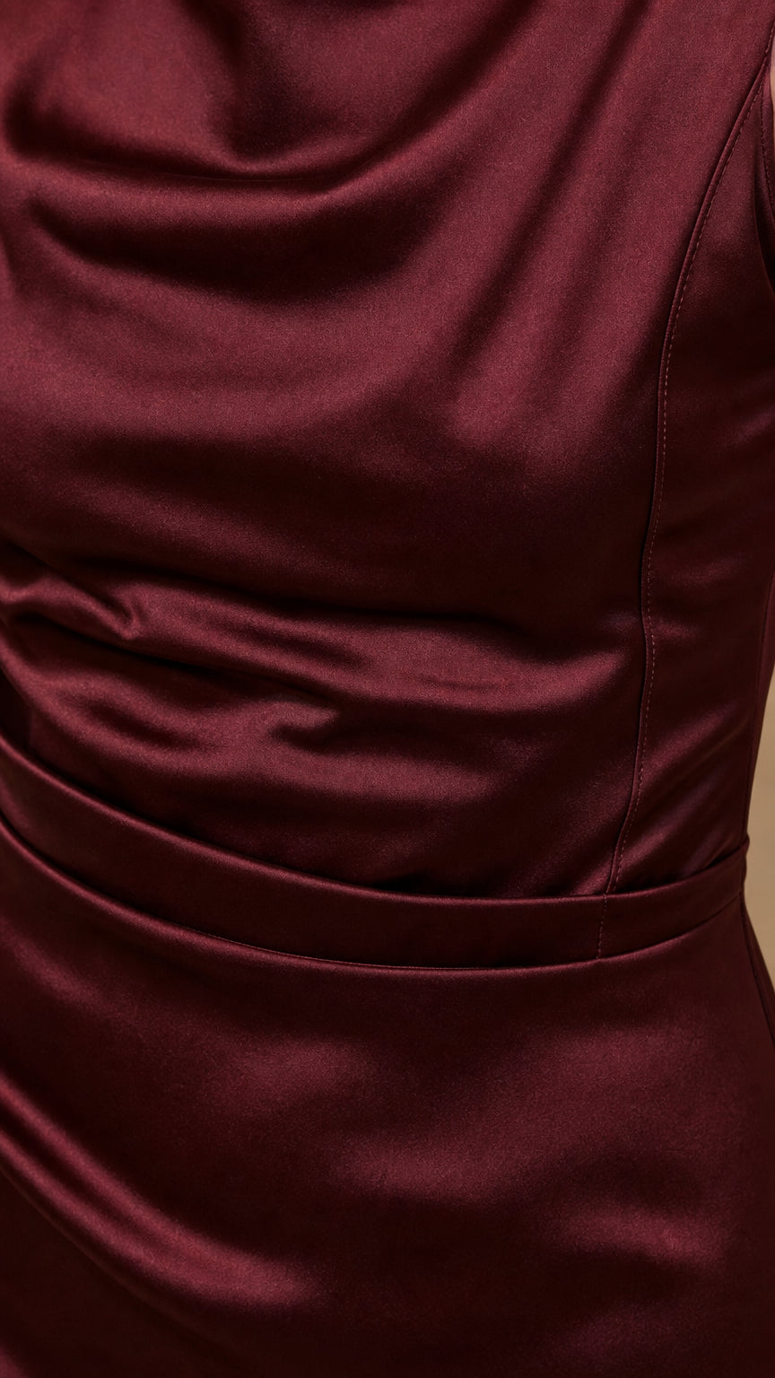 Close-up detail of smooth satin fabric and cowl neckline