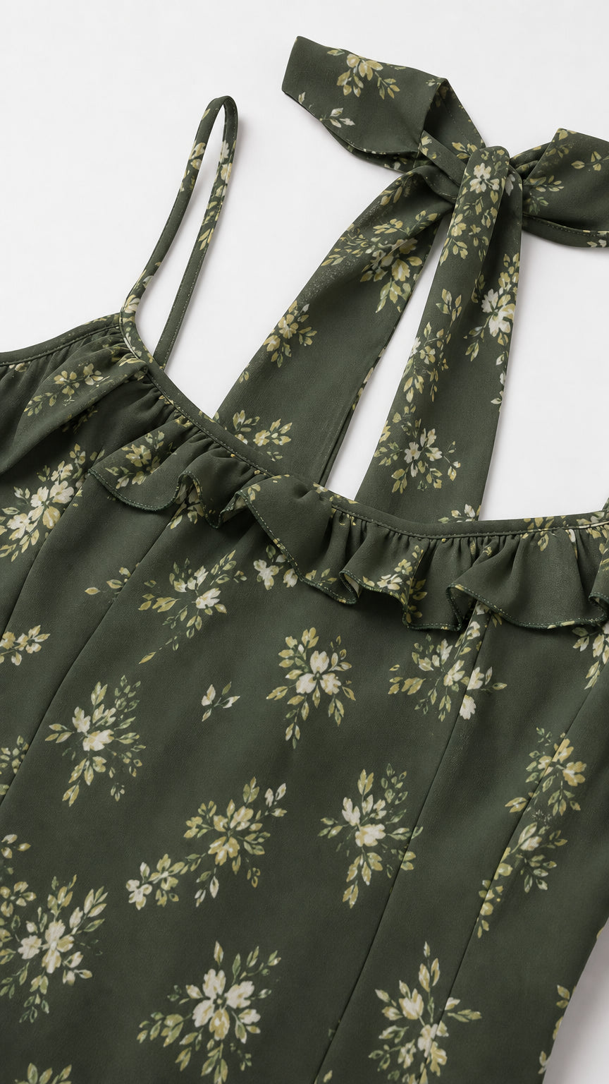 Close-up of choker neckline and cold shoulder straps on olive floral dress