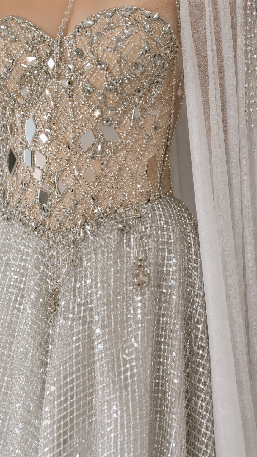 Close-up of crystal and mirror embellishments on bodice