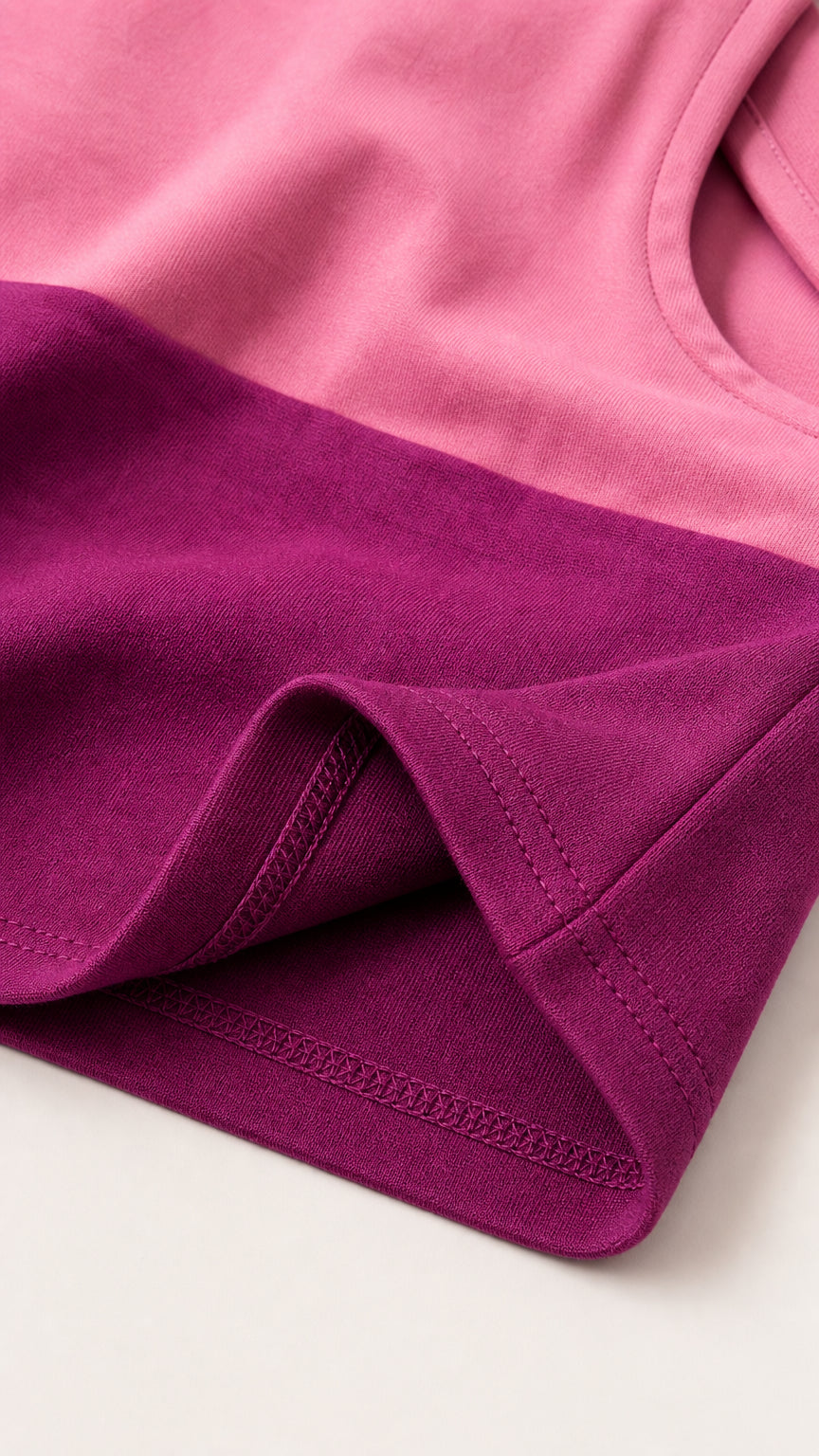 Close-up detail of pink and magenta fabric texture